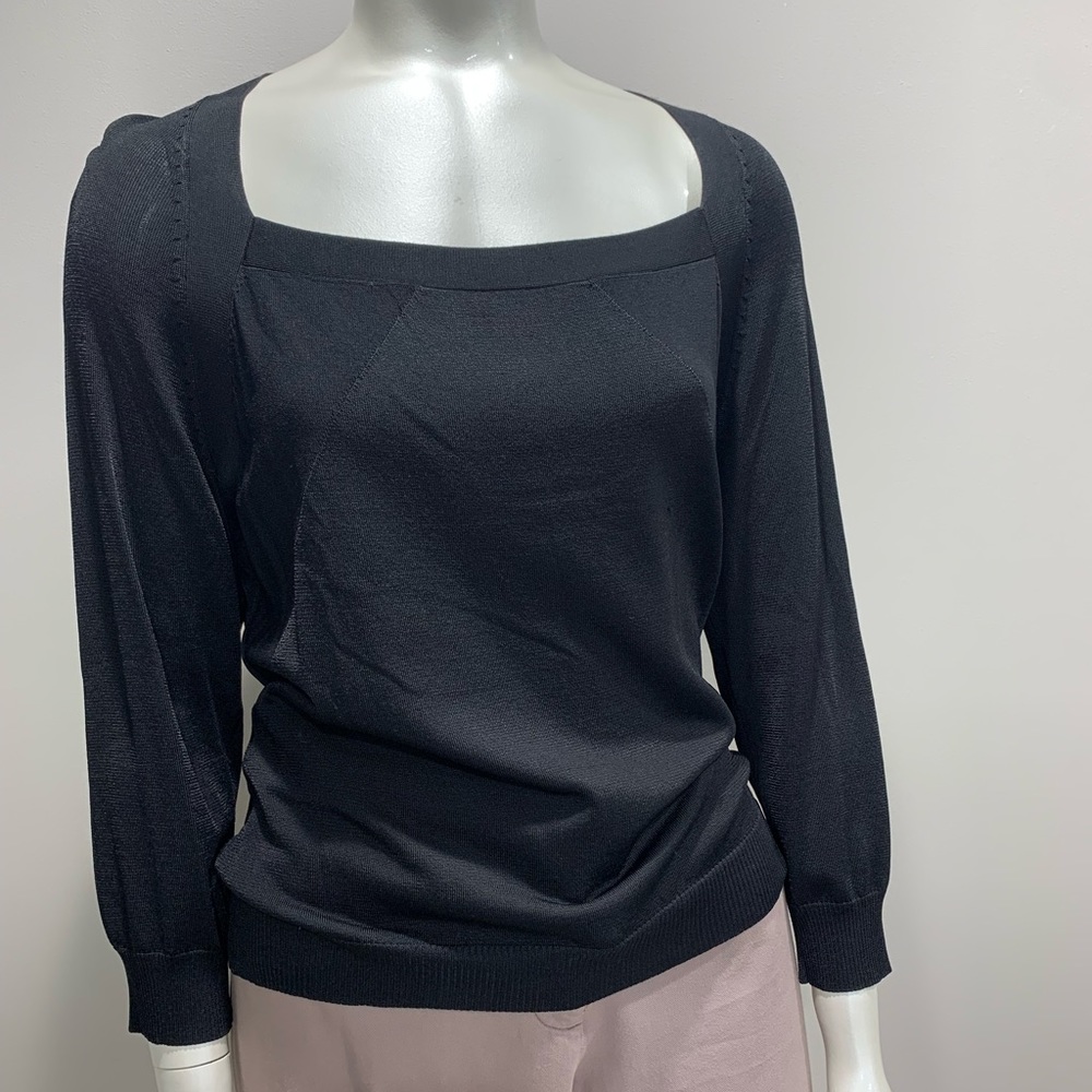 Light and comfy knit sweater. Size L